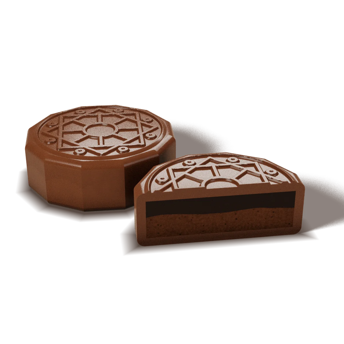 Chocolate Truffle chocolate with a milk chocolate shell, whole and cut open to show the filling