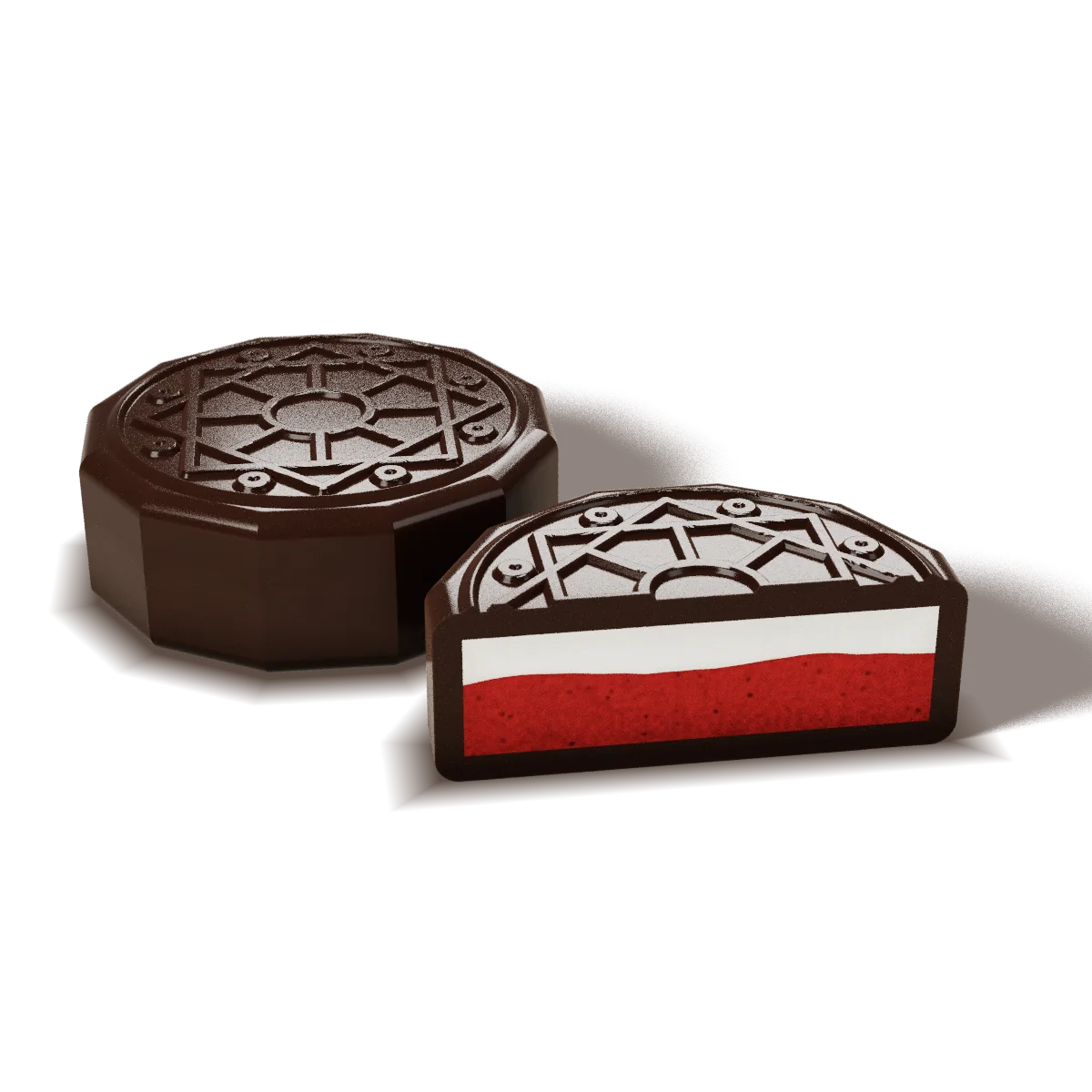 Red Velvet chocolate cut open to show red sponge and cream cheese ganache
